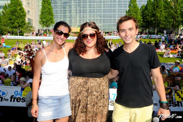 Tommy McFLY and Kelly Collis from 94.7 Fresh FM's 'The Tommy Show' flank artist Erin Willett.